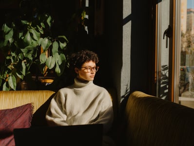 woman-sofa-green